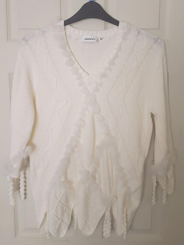 Preview of the first image of Lovely Cream Jumper With Feather Decoration - sz 16.   B25.