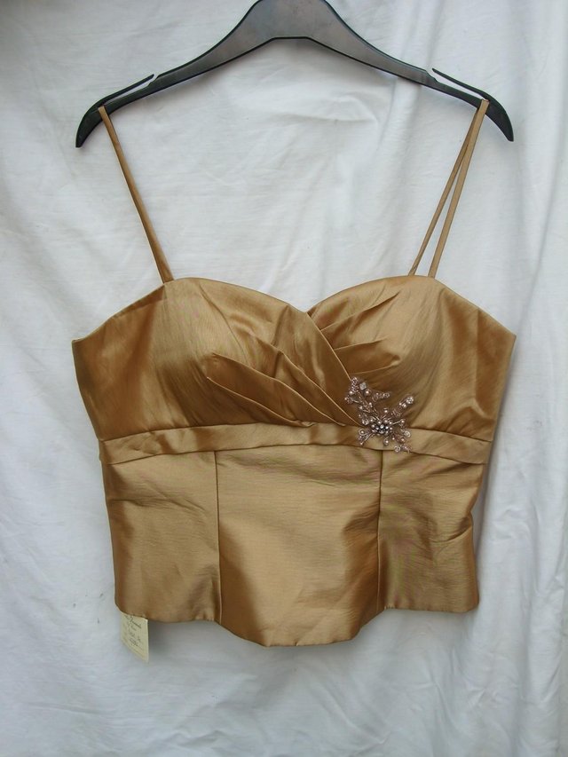 Preview of the first image of BELLA FORMALS Gold Bustier Top With Straps - Size 12 - NEW.