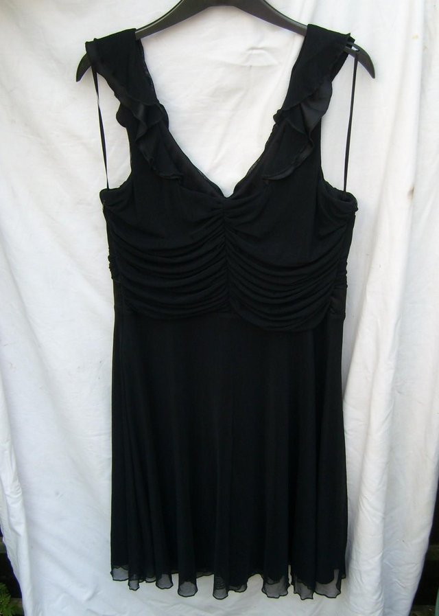 Preview of the first image of NEXT Black Chiffon Mini Dress - Size 16 - NEW.