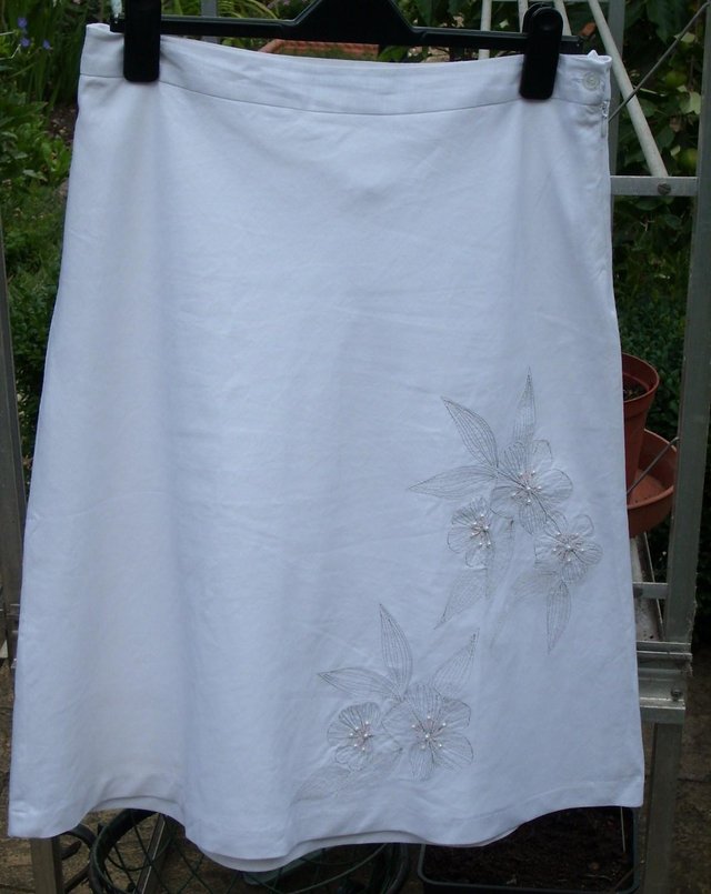 Preview of the first image of White Linen Mix Skirt-Embroidery/Pearl Detail-Size 12.