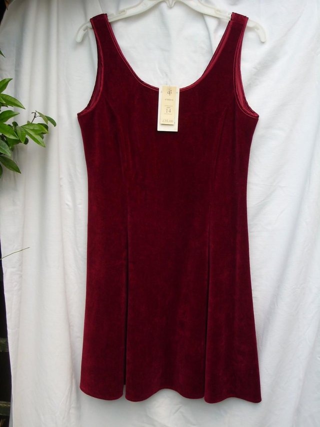 Preview of the first image of DORETHY PERKINS Red Velvet Dress – Size 14 - NEW.