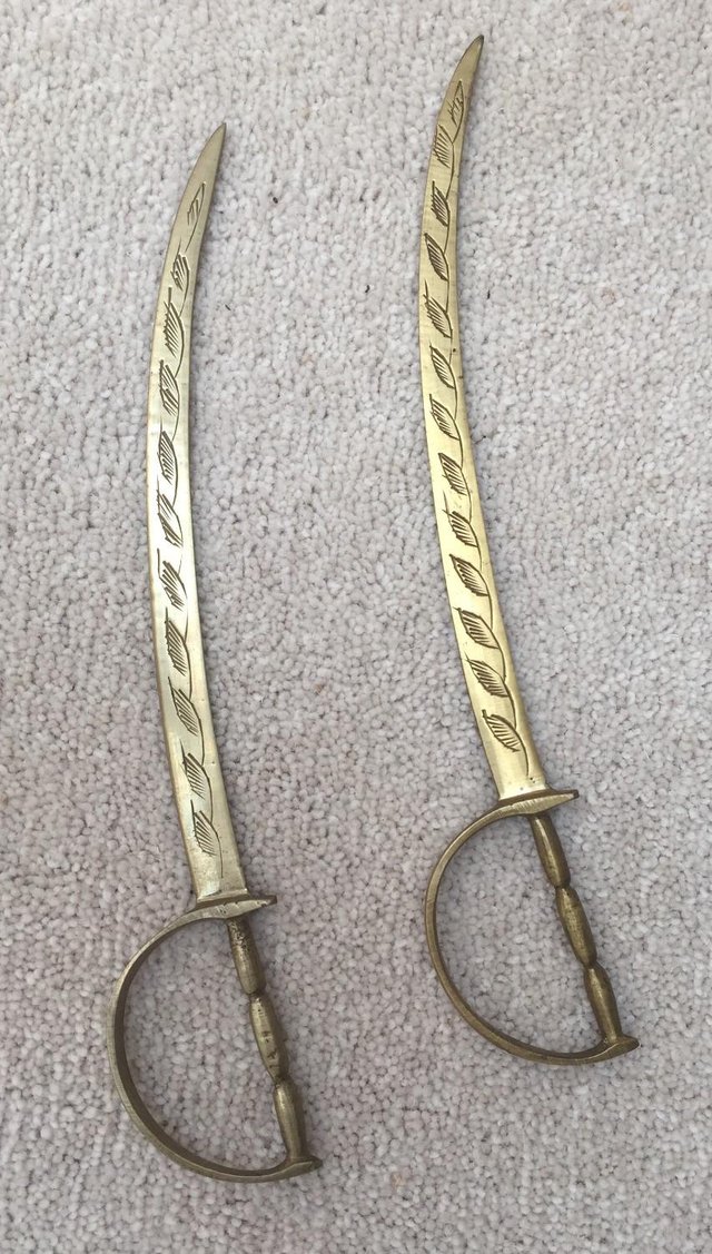 Preview of the first image of Brass Cutlass Letter openers.