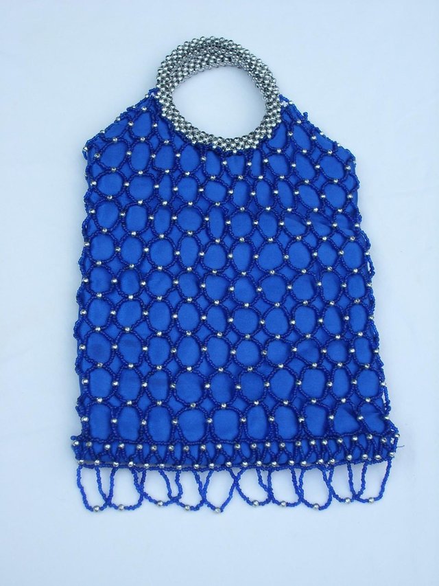 Preview of the first image of Electric Blue Beaded Handbag.