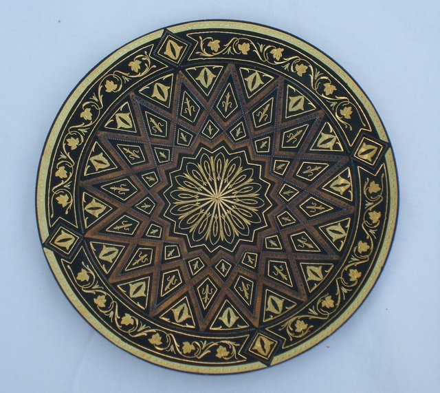 Preview of the first image of Small Decorative Metal Plate With Ball Feet.