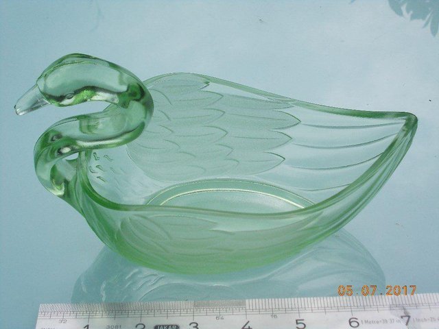 Preview of the first image of Vintage Green Glass Swan.