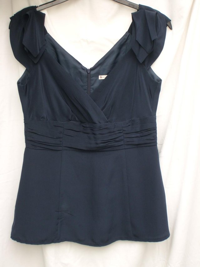 Preview of the first image of NANETTE LEPORE Navy Silk Sleeveless Top–Size 6/8.