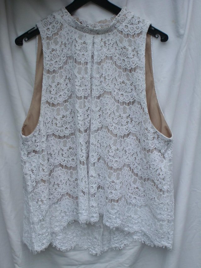 Preview of the first image of LOVE FIRE Retro High Neck Sleeveless Lace Top–Size 14/16.