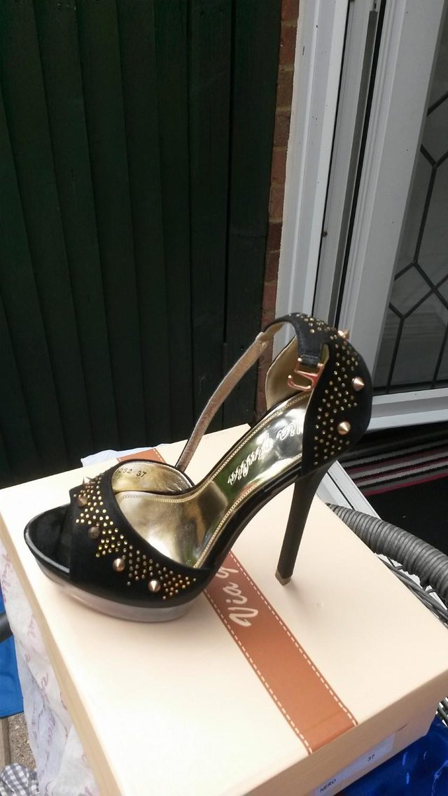Preview of the first image of Strappy Ladies Shoes.