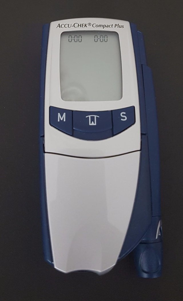 Preview of the first image of Accu Chek compact Plus Softclix Diabetes Monitoring Machine.
