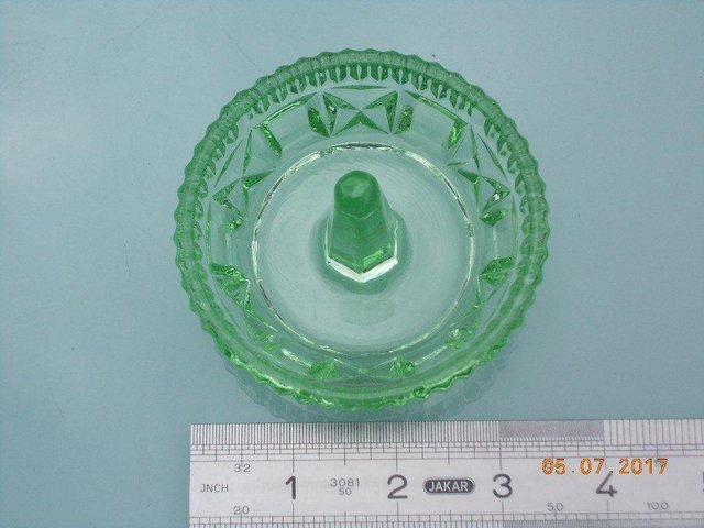 Preview of the first image of Vintage Green Glass Circular Ring Holder.