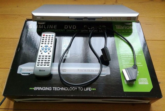 Preview of the first image of TEVION VISION SLIMLINE DVD PLAYER TSDVD1300 Boxed Remote.