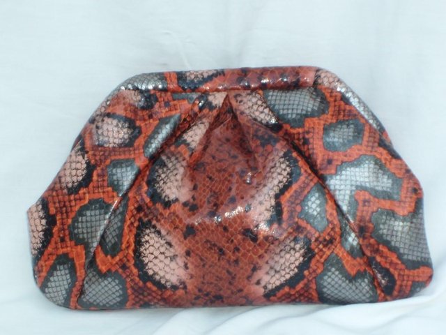 Preview of the first image of GLOBAL ACCESSORIES Orange Clutch Handbag NEW.