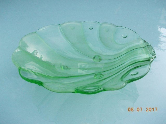 Preview of the first image of Vintage Green Glass Footed Dish.