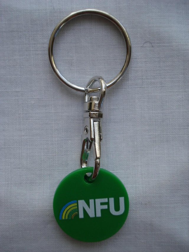 Preview of the first image of NEW NFU (NATIONAL FARMERS UNION) TROLLEY COIN KEYRING.