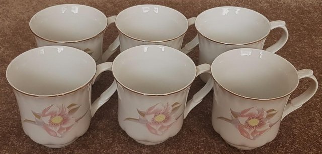 Preview of the first image of 6 new porcelain Cups With Flower Decoration By Crown Regal.