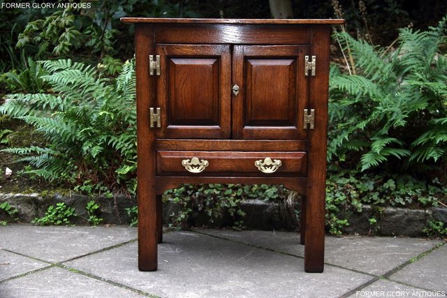 Preview of the first image of TITCHMARSH & GOODWIN SOLID OAK CABINET CUPBOARD HALL TABLE.