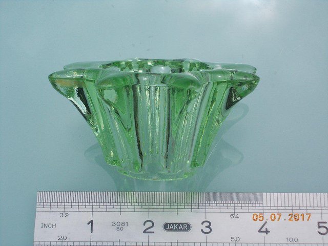 Preview of the first image of Vintage Green Glass Flower Holder.