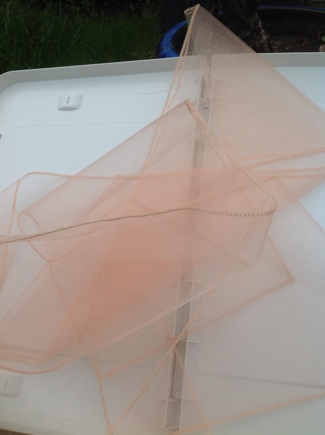 Preview of the first image of Wedding - peach organza chair sashes.