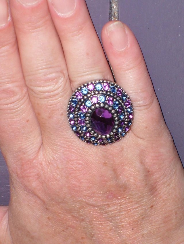 Preview of the first image of Costume Ring With Turquoise/Purple Stones.