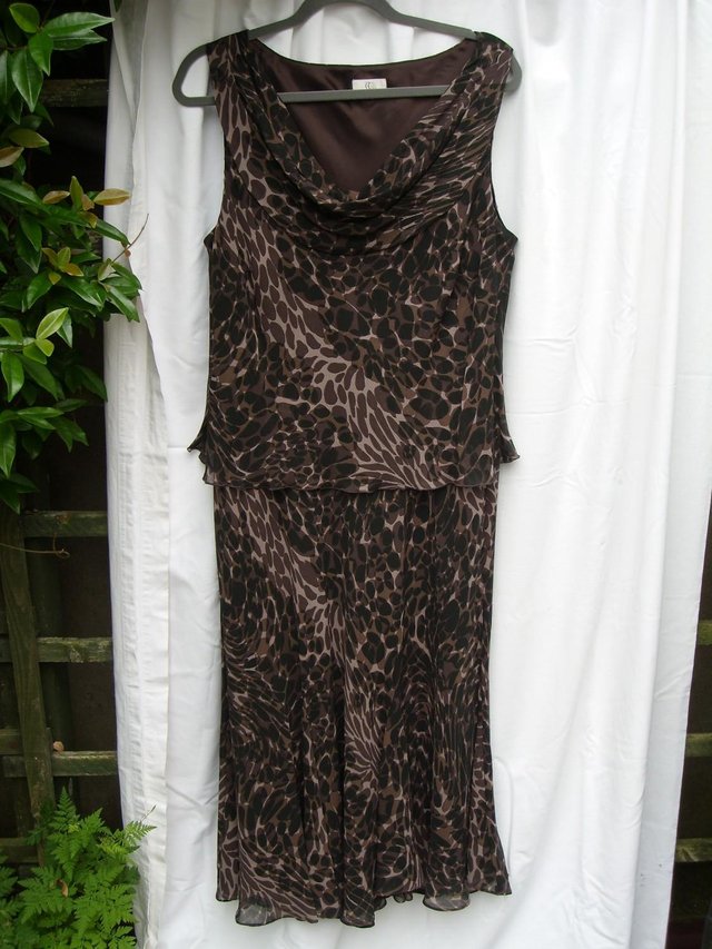 Preview of the first image of COUNTRY CASUALS Brown Silk Maxi Dress – Size 18.