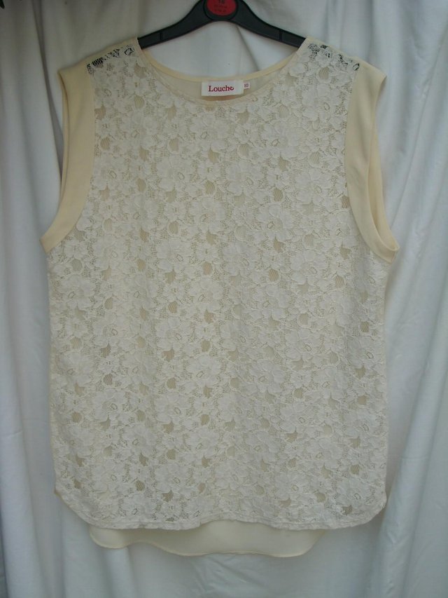 Preview of the first image of LOUCHE Cream Lace Sleeveless Top – Size 10.