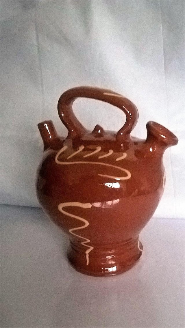 Preview of the first image of Studio Pottery olive oil or  vinegar jar  9" approx tall no.