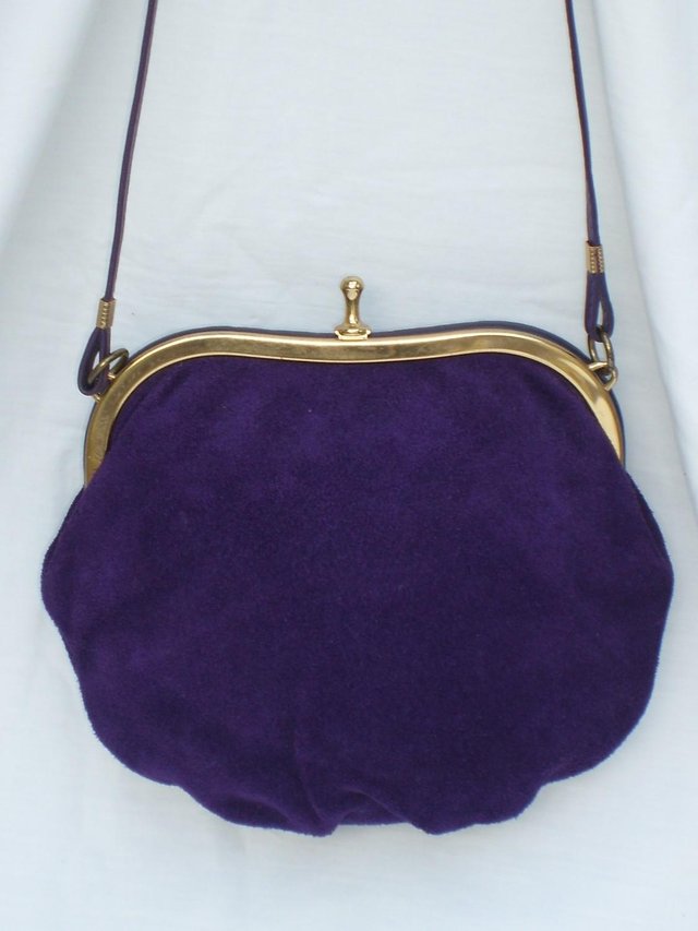 Preview of the first image of DEBENHAMS Vintage Purple Suede Snap Top Handbag.