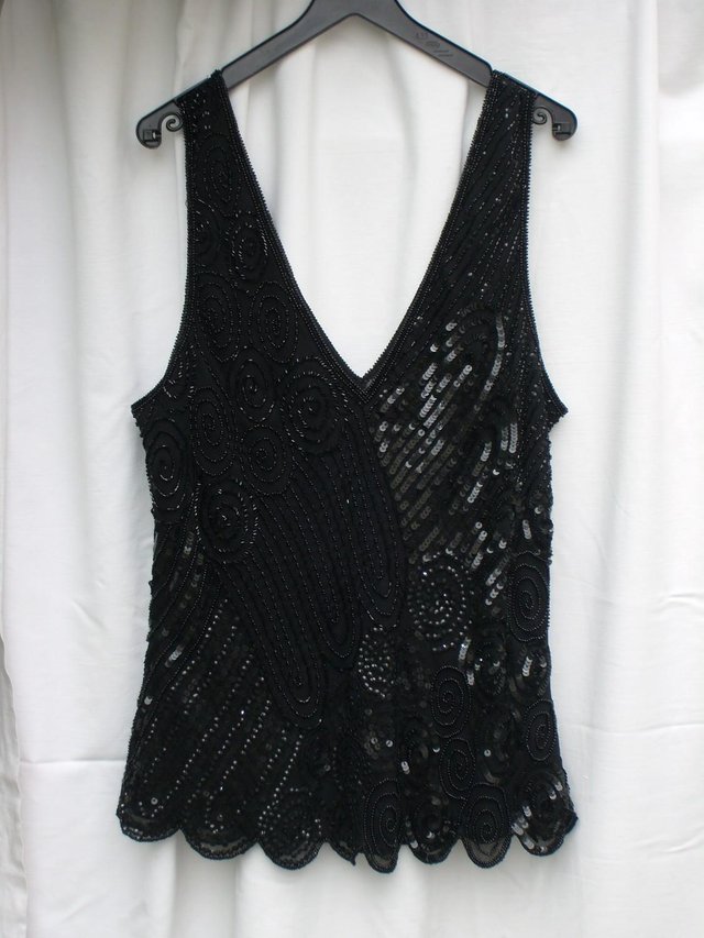 Preview of the first image of MONSOON Black Silk Beaded Top – Size 14.