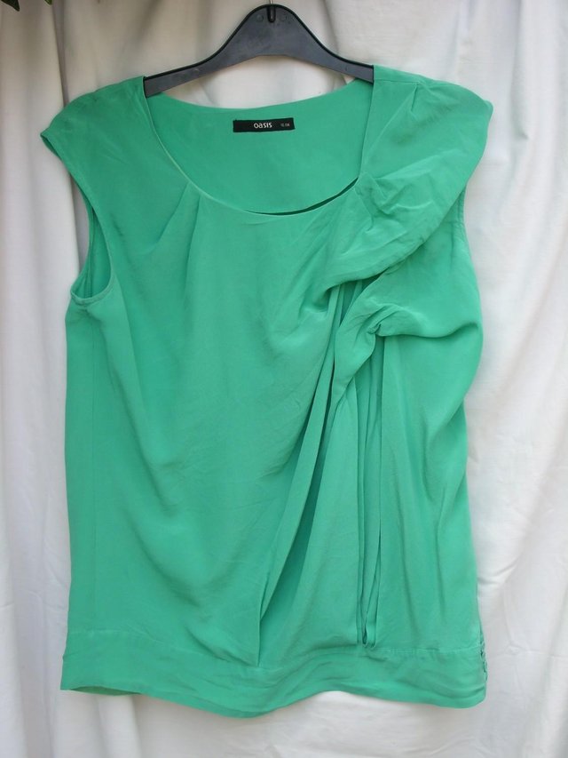 Preview of the first image of OASIS Emerald Green Silk Top – Size 12.