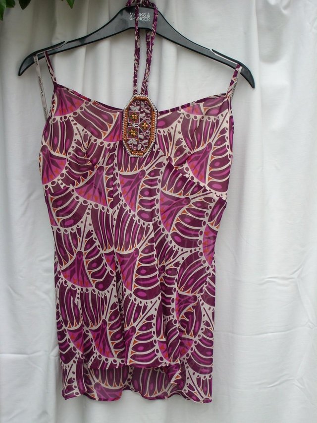 Preview of the first image of WAREHOUSE Pink Print Silk Top – Size 14.