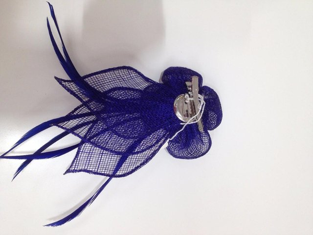 Preview of the first image of Fascinators midnight blue with clip or brooch fastening.