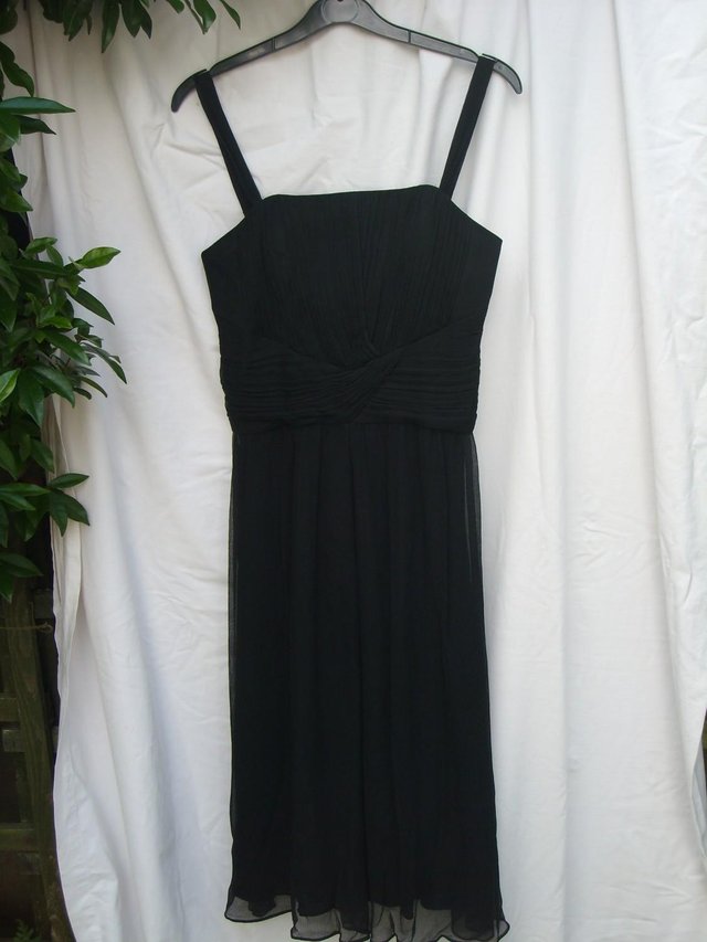 Preview of the first image of L K BENNETT Black Silk Dress – Size 8.
