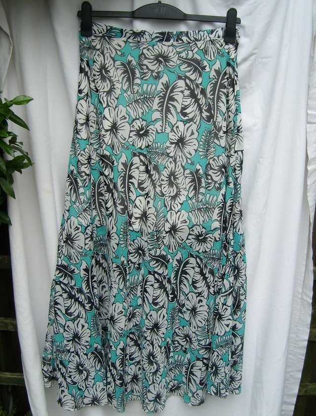 Preview of the first image of PAPAYA WEEKEND Turquoise Print Maxi Skirt – Size 10 NEW.