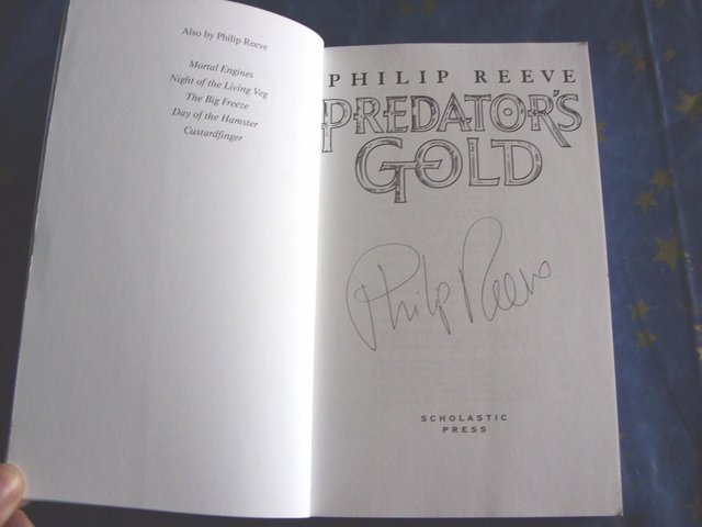 Preview of the first image of PREDATOR'S GOLD  BY PHILIP REEVE  SIGNED PB & UNCORRECTED PR.
