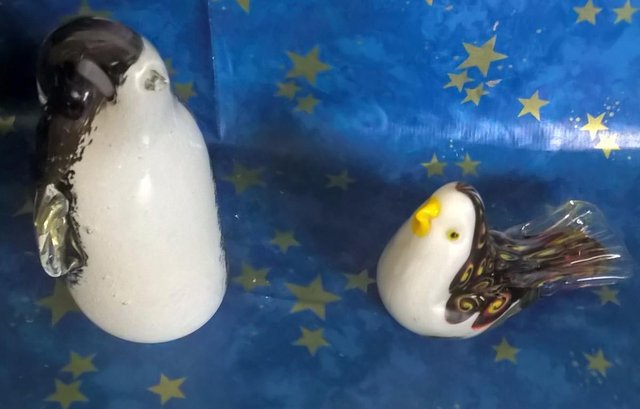 Preview of the first image of collection of two Glass birds Penguin and small a  bird Peng.