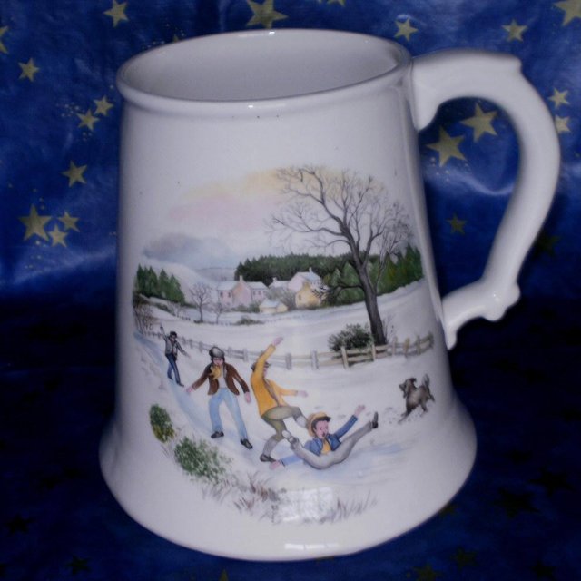 Preview of the first image of Large Tankard with a decorative snow scene6" tall good co.