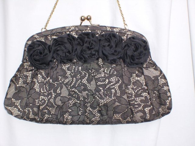 Preview of the first image of LIZ CLAIBOURNE Snap Top Handbag/Clutch NEW!.