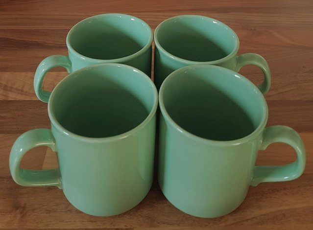 Preview of the first image of Lovely Set Of 4 Green Mugs.    BX3.