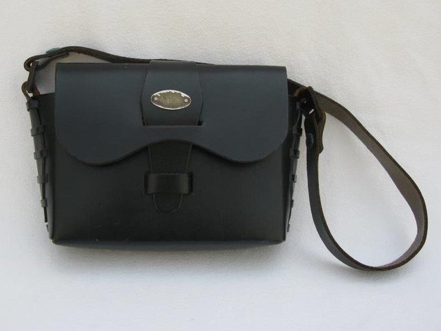 Preview of the first image of Black Leather Handbag.