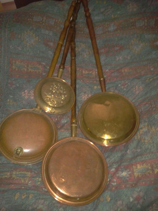 Preview of the first image of Antique Copper and Brass bed warming pans with oak handles.