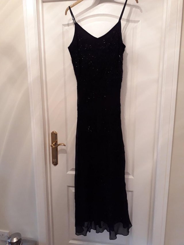 Preview of the first image of Black full length ball gown/party dress. Size 12.