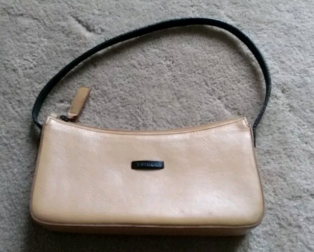 Preview of the first image of Thiros (Greek Designer) Beige Leather Under Arm Bag.