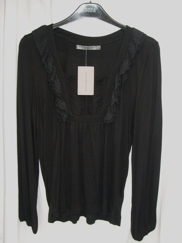 Preview of the first image of ZARA Black Long Sleeve Ruffle Top  – Size L (14) – NEW +TAGS.