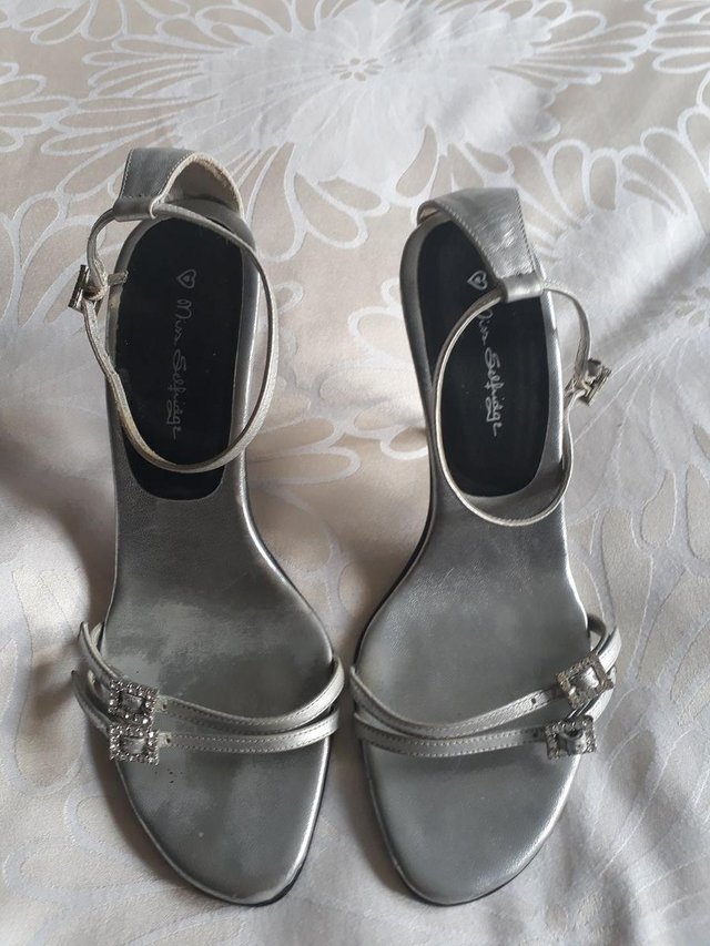 Preview of the first image of Miss Selfridge silver strappy sandals- size 6.