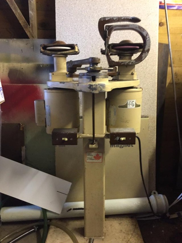 Preview of the first image of Ice skate grinding machine.