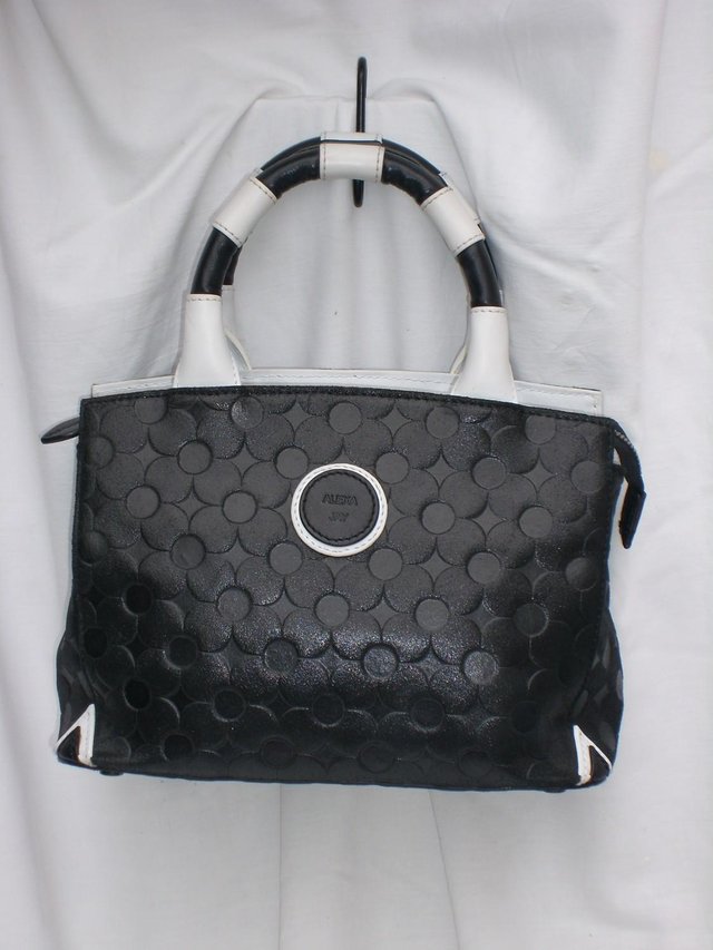 Preview of the first image of ALEXA JAY Mini Domino Leather Grab Bag Handbag.