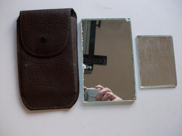 Preview of the first image of VINTAGE MIRROR IN BROWN LEATHER CASE & SMALL MIRROR **TATTY*.