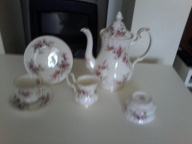 Preview of the first image of Royal Albert lavender rose 21 piece coffee set.