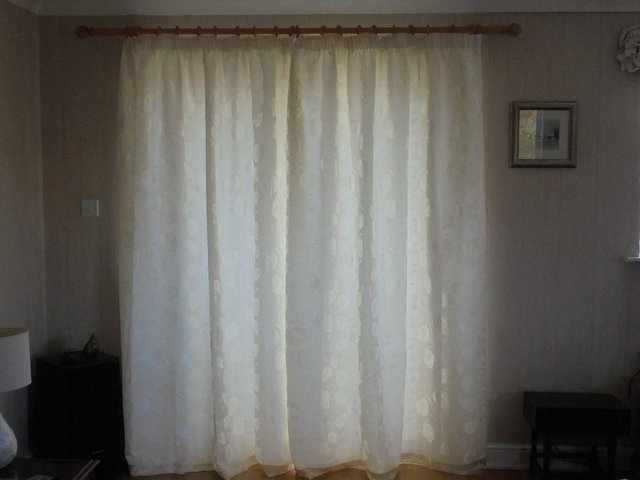 Preview of the first image of Ivory Sateen Curtains - 66"x 84" - pencil pleat.