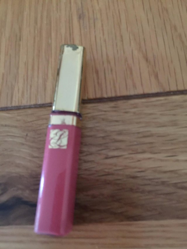 Preview of the first image of Genuine Estee Lauder LIP GLOSS tester pink.